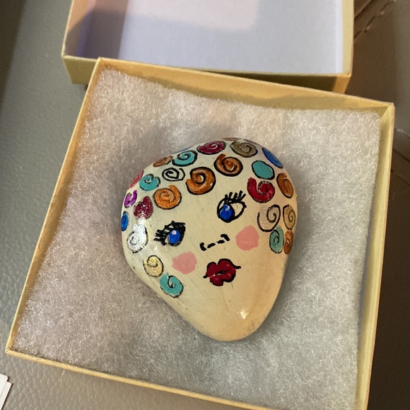 Colorful Hand painted woman on rock - Picture 1 of 3